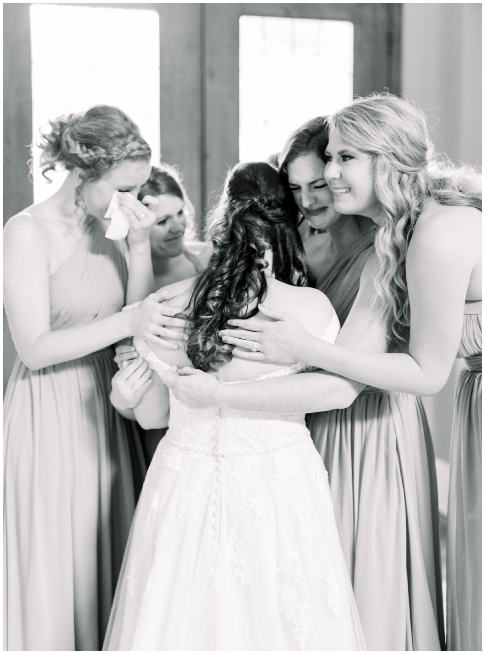 bridesmaids hugging the bride and crying, atlanta ga wedding photographer