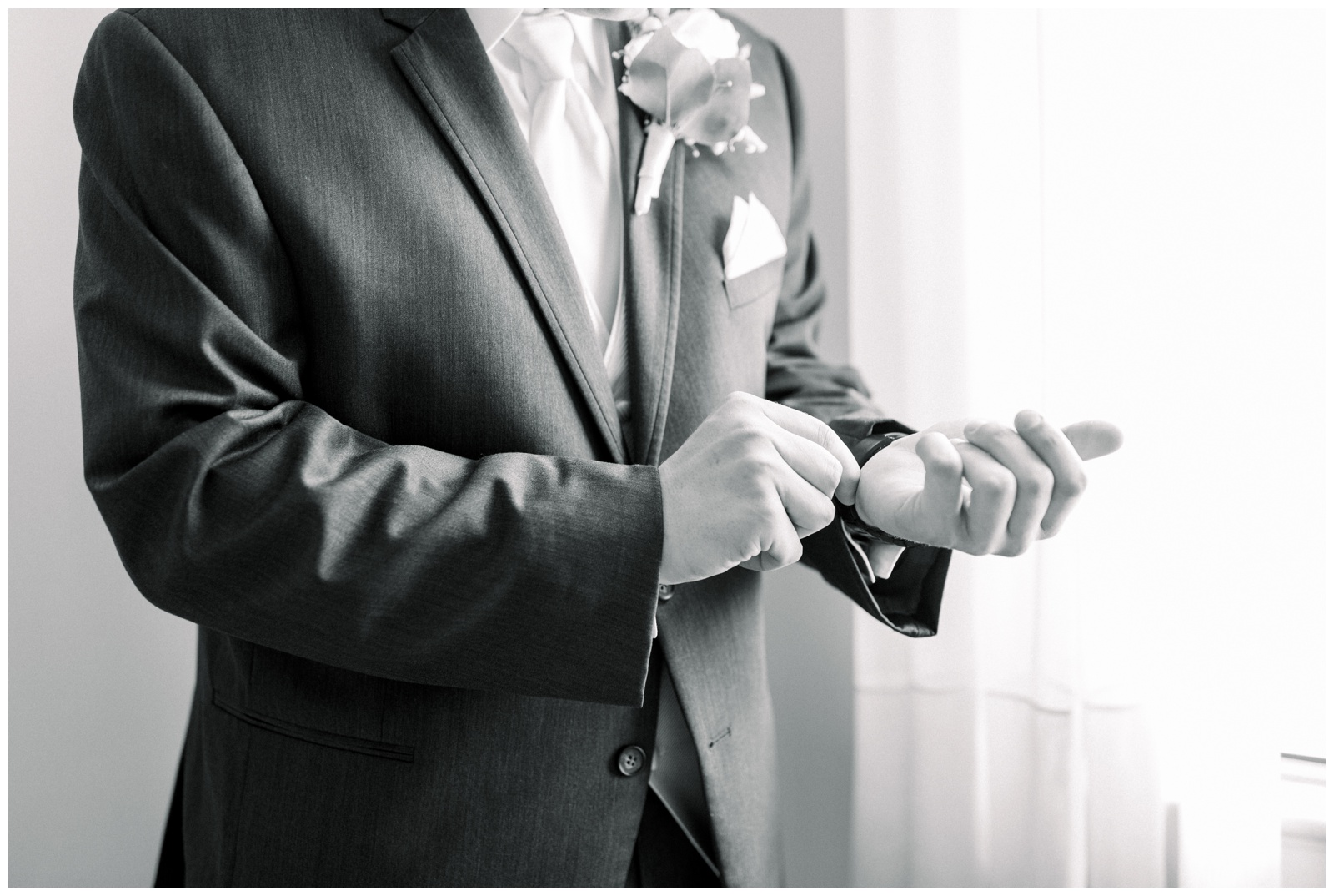 groom adjusting cufflinks, atlanta wedding photographer