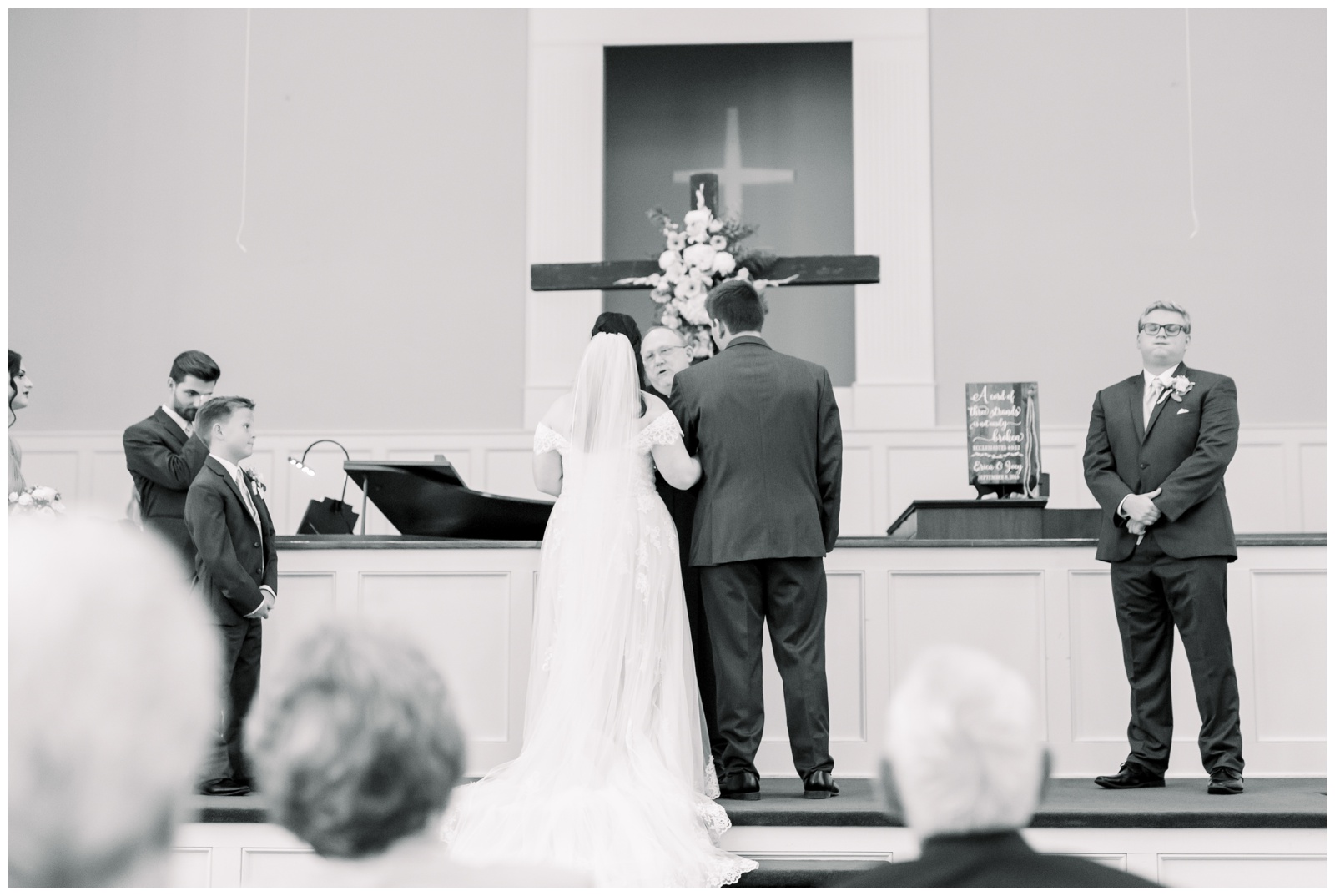 bride and groom at alter, atlanta wedding photographer