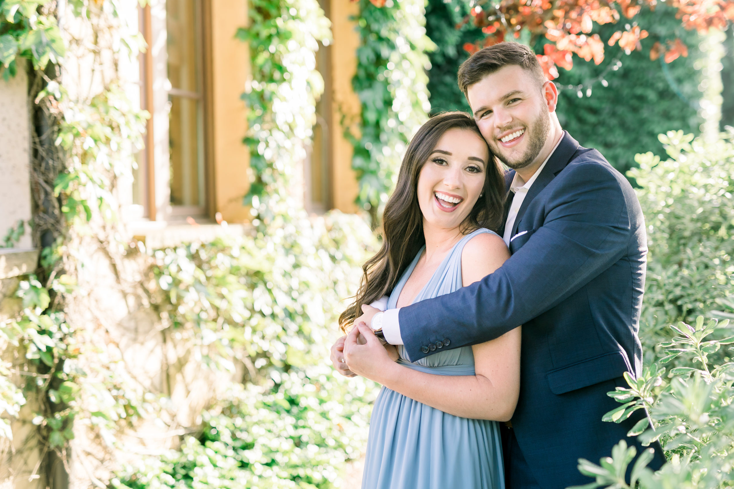 Couple embracing during their engagement photos