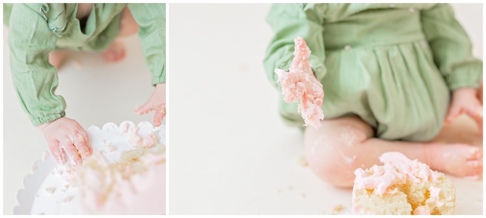 close up of 1 year old hands eating pink naked cake, organic floral hoops in background, cake smash session